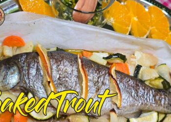Riba Pastrva pečena u papirnatom čamčiću: Harmonija okusa i mirisa s tikvicama, lukom i mrkvom.