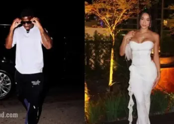 Keeta Vaccaro blista u bijeloj odjeći tijekom kasnonoćnog treninga u teretani