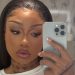 Megan Thee Stallion duboka majica za vježbanje postaje sve riskantnija s svakim centimetrom