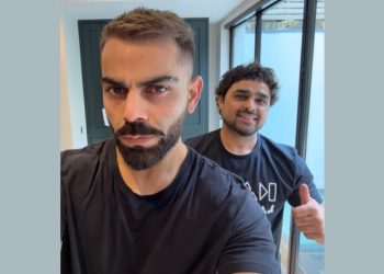 Virat Kohli osvaja naslove na RCB IPL 2026. s novim pastelnih izgledom kose koji postaje viralni hit | Virat Kohli nova frizura | Virat Kohli pastelna kosa | RCB IPL 2026 | Virat Kohli viralni izgled | Rashid Salmani | Royal Challengers Bengaluru | Kohli nova boja kose